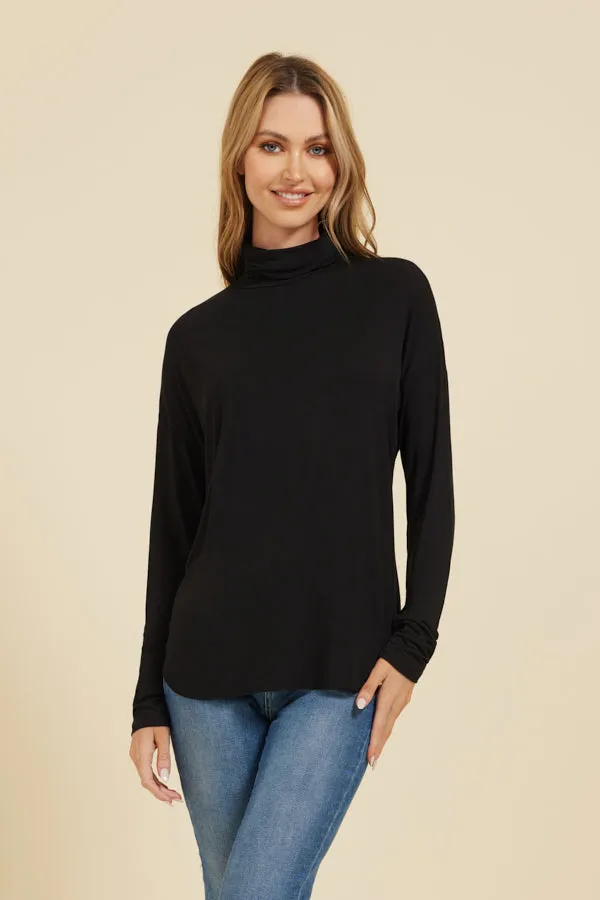 Majestic Soft Touch Semi-Relaxed Long Sleeve Drop Shoulder Turtleneck in Noir